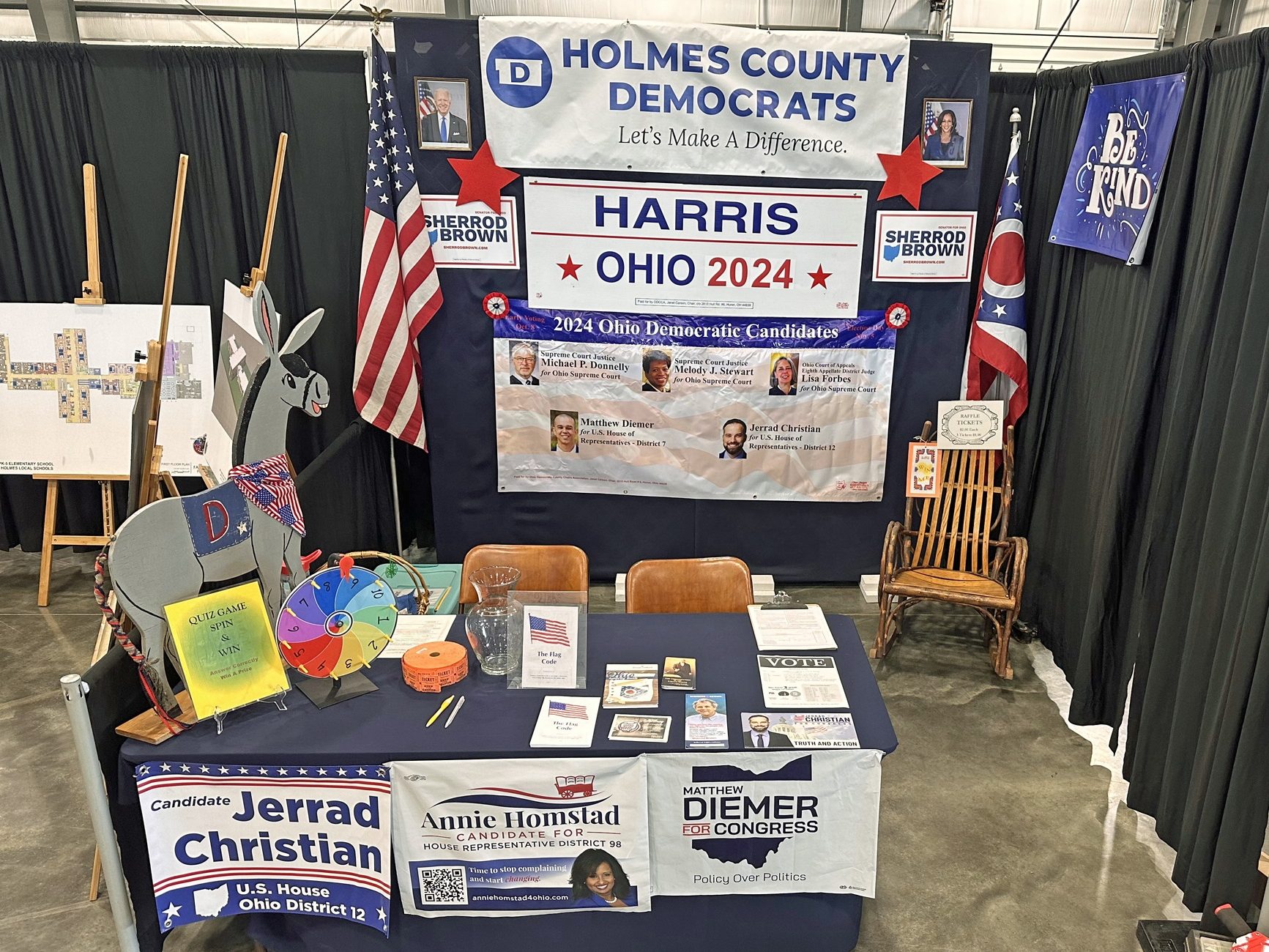 political signs at county fair booth