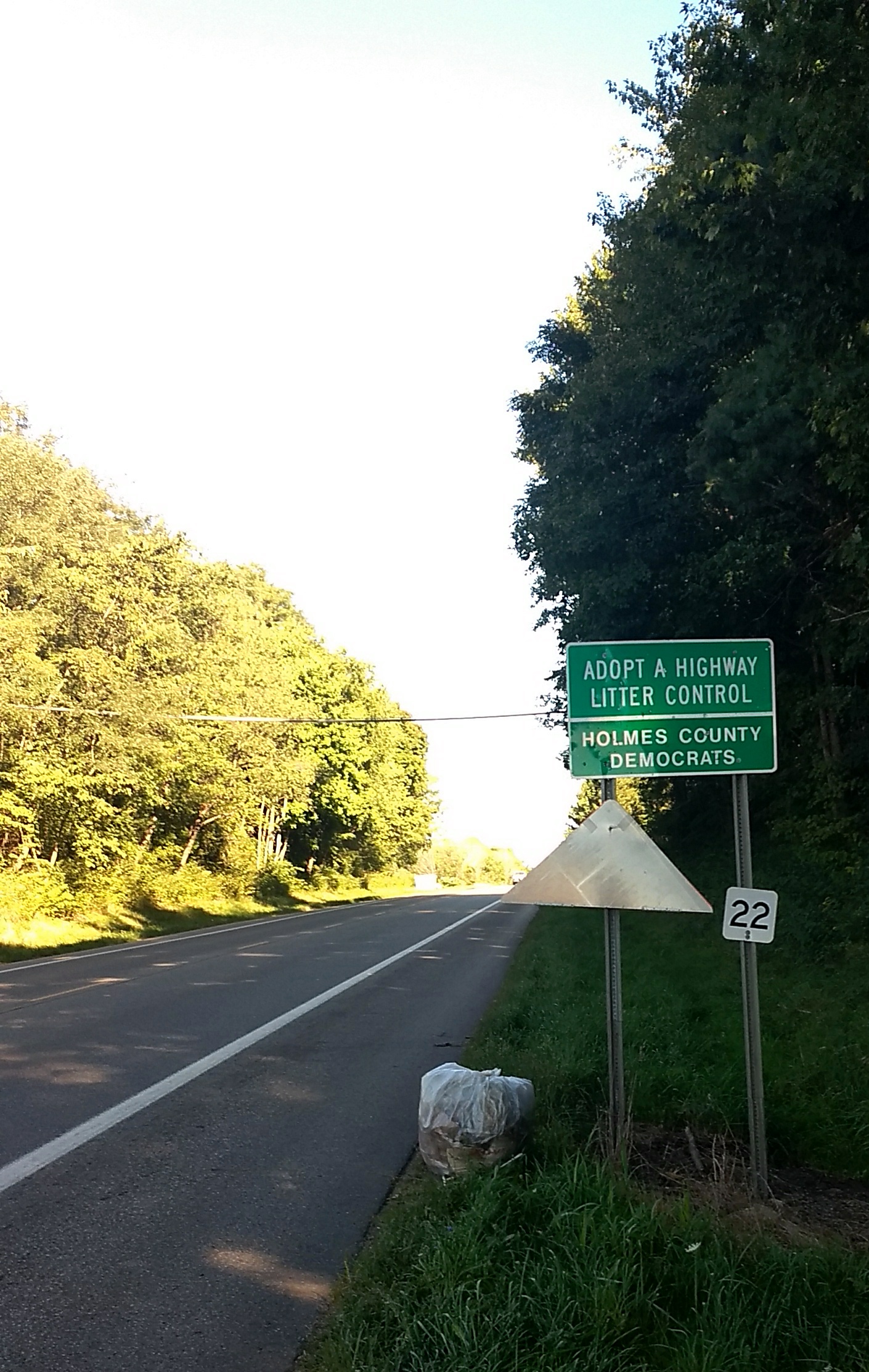 Holmes County Democrats - adopt a litter highway control sign on the side of a road. 